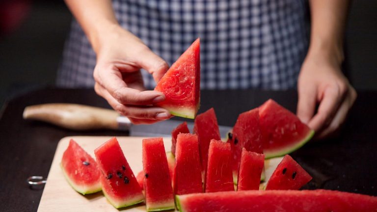 person-cutting-watermelon.jpg